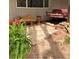 Quaint outdoor seating area with a swing, complemented by lush greenery and a tranquil ambiance at 7350 Banks Mill Rd, Douglasville, GA 30135