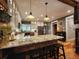 Kitchen featuring an island, stainless steel appliances, and granite countertops at 7350 Banks Mill Rd, Douglasville, GA 30135