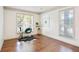 Bright office space with hardwood floors, neutral walls, and two large windows at 275 Carriage Chase, Fayetteville, GA 30214