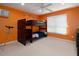Orange bedroom featuring a bunk bed and large window at 5900 Fords Nw Rd, Acworth, GA 30101