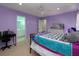 A charming bedroom with a writing desk and a peek into the bathroom at 5900 Fords Nw Rd, Acworth, GA 30101