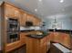 Well-equipped kitchen features stainless appliances, double oven, kitchen island, and granite countertops at 5900 Fords Nw Rd, Acworth, GA 30101