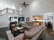 Bright, open living room with hardwood floors, columns, and views to the dining room and kitchen at 5900 Fords Nw Rd, Acworth, GA 30101