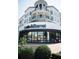 The Crate & Barrel store building, featuring a sleek design, is surrounded by greenery at 118 Iveybrooke Ln # 64, Alpharetta, GA 30009