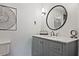 Stylish bathroom features a gray vanity with marble countertop and modern fixtures at 1468 Briarwood Ne Rd # 703, Atlanta, GA 30319