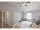 Comfortable bedroom featuring a vaulted ceiling, and a large bed at 1468 Briarwood Ne Rd # 703, Atlanta, GA 30319