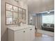 Open-concept kitchen next to a living space and featuring a large mirror at 1468 Briarwood Ne Rd # 703, Atlanta, GA 30319