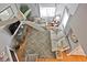 Inviting living room with stylish rug, ceiling fan, and cozy seating arrangement at 1468 Briarwood Ne Rd # 703, Atlanta, GA 30319