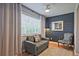 Cozy sitting room featuring modern furniture, stylish decor, and soft natural light at 1468 Briarwood Ne Rd # 703, Atlanta, GA 30319
