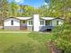 Charming single-Gathering home with a well-manicured lawn and beautiful natural surroundings at 2784 Sixes Rd, Canton, GA 30114