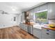Lovely kitchen featuring ample counter space, stainless steel appliances and an eat-in dining area at 2784 Sixes Rd, Canton, GA 30114