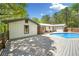 The spacious wooden deck surrounds a refreshing inground pool perfect for entertaining at 2784 Sixes Rd, Canton, GA 30114