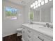 Bright bathroom with double vanity, marble countertops, and updated fixtures at 2990 Williams Farm Dr, Dacula, GA 30019