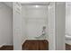 Walk-in closet with hardwood floors and wire shelving at 2990 Williams Farm Dr, Dacula, GA 30019