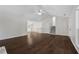 Expansive living room featuring hardwood floors, vaulted ceilings, and ample natural light at 2990 Williams Farm Dr, Dacula, GA 30019