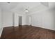 Large main bedroom with beautiful tray ceilings and dark wood flooring at 2990 Williams Farm Dr, Dacula, GA 30019