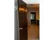 Bathroom featuring tiled floors, brown door and tiled walls at 5679 Coopers Glen Ct, Mableton, GA 30126