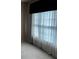 Bedroom featuring neutral walls, carpet floors, and window with blinds and curtains at 5679 Coopers Glen Ct, Mableton, GA 30126