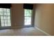 Standard bedroom with neutral carpet, large window, and a neutral paint color at 5679 Coopers Glen Ct, Mableton, GA 30126