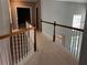 Hallway with view of stairs and downstairs living area at 5679 Coopers Glen Ct, Mableton, GA 30126