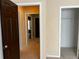 Hallway featuring neutral walls, carpet floors, and doors leading to other rooms at 5679 Coopers Glen Ct, Mableton, GA 30126