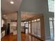 Kitchen with stainless steel appliances, granite countertops, and eat-in area, featuring hardwood floors at 5679 Coopers Glen Ct, Mableton, GA 30126