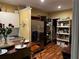 Functional kitchen featuring stainless steel appliances, laminate flooring, and ample storage at 5679 Coopers Glen Ct, Mableton, GA 30126