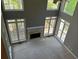 Spacious living room with fireplace and lots of natural light at 5679 Coopers Glen Ct, Mableton, GA 30126