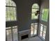 Spacious living room with fireplace and lots of natural light at 5679 Coopers Glen Ct, Mableton, GA 30126