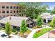 Stunning aerial view showcasing a mix of restaurants and retail stores with well-maintained landscaping at 11140 Brookhollow Trl, Alpharetta, GA 30022