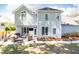 Spacious backyard featuring a patio with outdoor seating, a lush lawn, and mature trees for privacy at 11140 Brookhollow Trl, Alpharetta, GA 30022