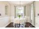 Cozy dining area featuring neutral decor and natural lighting, creating a welcoming atmosphere at 11140 Brookhollow Trl, Alpharetta, GA 30022