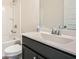 Bathroom features a tub and shower combination with single sink vanity at 1780 Morningtide Ne Ln, Atlanta, GA 30324