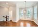 Bright dining area with hardwood floors, ample natural light, and stylish modern light fixture at 1780 Morningtide Ne Ln, Atlanta, GA 30324