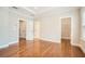 Spacious main bedroom features hardwood floors, tray ceiling, recessed lights, and access to the walk-in closet at 1780 Morningtide Ne Ln, Atlanta, GA 30324