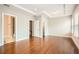 Main bedroom features tray ceiling, hardwood flooring and natural light at 1780 Morningtide Ne Ln, Atlanta, GA 30324