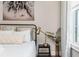 Detailed bedroom with soft linens and a decorative lamp at 472 Burton Dr, Alpharetta, GA 30009
