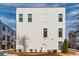 White brick building showcasing its minimalist design, accentuated by clean lines and a well-maintained lawn at 472 Burton Dr, Alpharetta, GA 30009