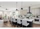 Open-concept kitchen seamlessly connects to the living area for easy entertaining at 472 Burton Dr, Alpharetta, GA 30009