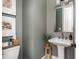 Stylish powder room with modern fixtures, elegant decor, and a well-designed layout at 472 Burton Dr, Alpharetta, GA 30009