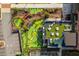Aerial view of the outdoor rooftop amenities including a mini golf course and a lounge area at 472 Burton Dr, Alpharetta, GA 30009