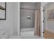 Contemporary bathroom featuring gray tile, a shower over a tub, and hexagonal floors at 701 Smith St, Atlanta, GA 30310