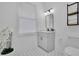 Bright bathroom with white vanity and patterned tile flooring at 701 Smith St, Atlanta, GA 30310