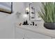 Bright bathroom vanity with modern fixtures, decorative mirror, and stylish accents at 701 Smith St, Atlanta, GA 30310
