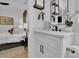 Bathroom vanity near a bedroom, featuring a white countertop, modern fixtures, and stylish decor at 701 Smith St, Atlanta, GA 30310