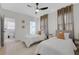 Comfortable bedroom with twin beds, ceiling fan, and bright natural lighting at 701 Smith St, Atlanta, GA 30310
