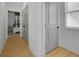 Bright hallway with closet space and a view into the bedroom at 701 Smith St, Atlanta, GA 30310