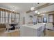 Bright kitchen with a large island, quartz countertops, pendant lighting, and an open concept at 701 Smith St, Atlanta, GA 30310