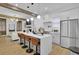 Open concept kitchen featuring an island with seating and modern appliances at 701 Smith St, Atlanta, GA 30310