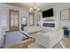 Bright living room featuring a billiard table and cozy seating area at 701 Smith St, Atlanta, GA 30310